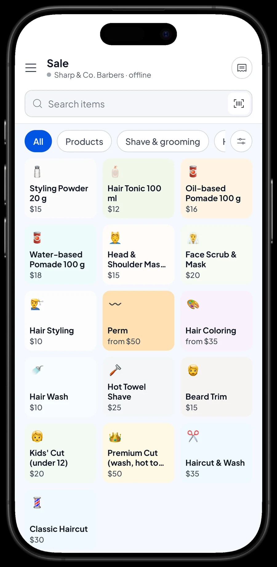 The Sale screen at Sharp & Co. Barbers with services by category and a client's ticket ready to pay